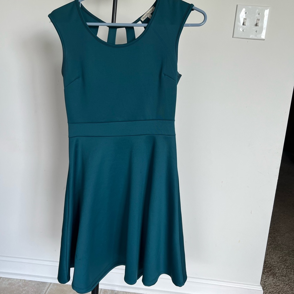 Blue spandex-like dress with cute back cutout